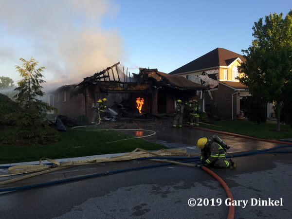 attached garage destroyed by fire
