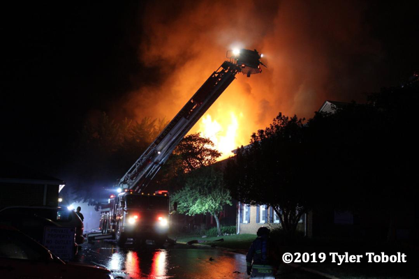 massive flames from house fire at night