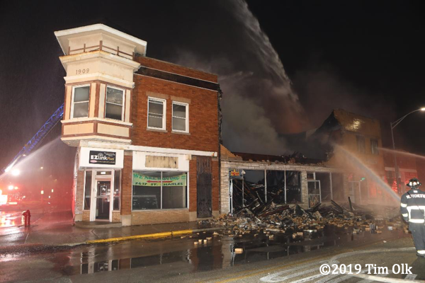 fire destroys commercial buildings