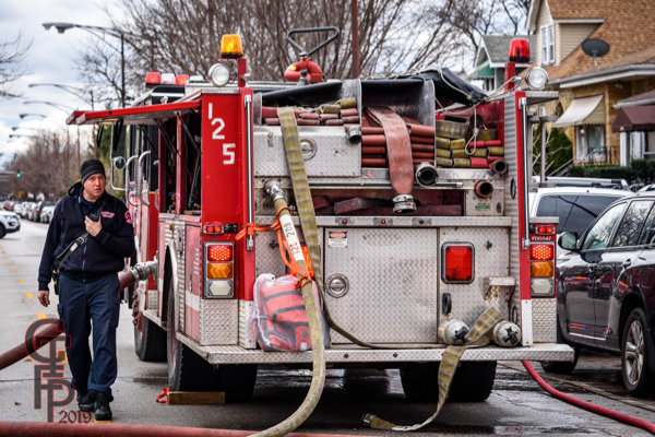 Chicago fire engine hose load