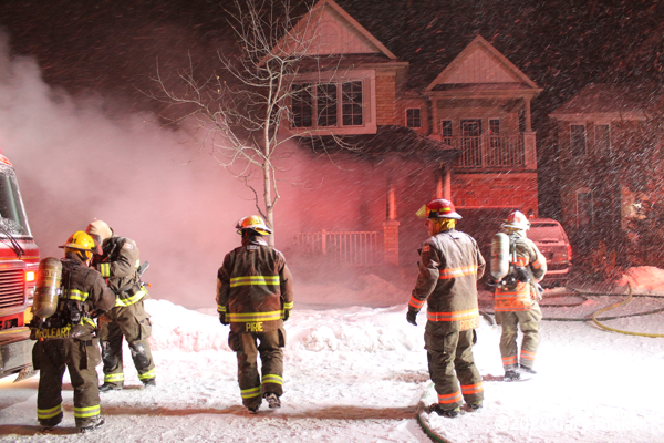 Cambridge Firefighters battle winter house fire at night