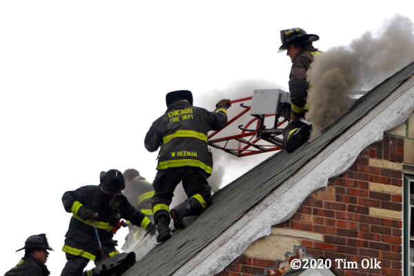 Chicago Firefighters on house roof