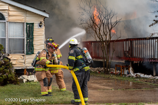 Firefighters use a 2 1/2 inch hand line at a fire
