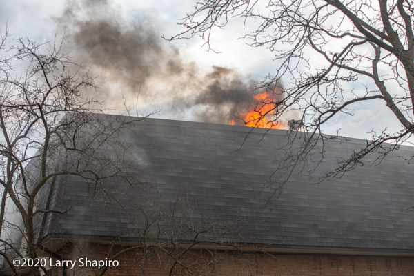 building fire with mansard roof