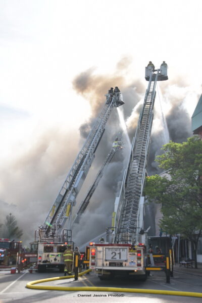 four tower ladders battle Lapeer fire