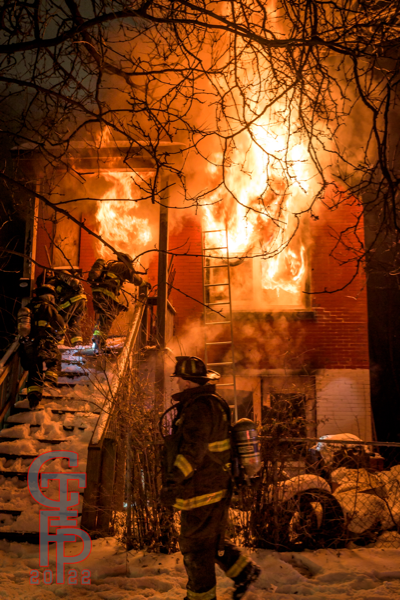 massive flames engulf vacant house at night